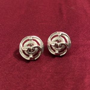 Sterling color Trifari clip on swirl earrings